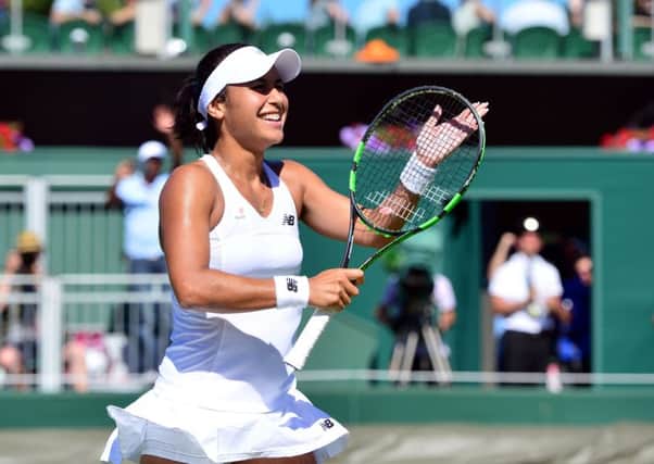 FAST MOVER: British No 1 Heather Watson beams with delight after beating No 32 seed Caroline Garcia, of France 1-6 6-3 8-6. Watson will face Slovakian Daniela Hantuchova in the next round with the possibility of playing Serena Williams if she gets through.  Picture: Dominic Lipinski/PA