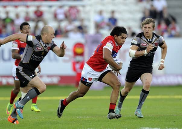 MAIN MAN: Albert Kelly pushes forward for Hull KR against  Salford Reds. Picture: Bruce Rollinson