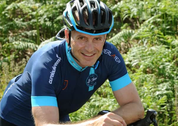 Simon Gueller, owner of the Box Tree in Ilkley, has been training on the roads near his home for the One Day Ahead Challenge on the Tour de France route. Picture: Gary Longbottom