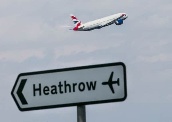 A British Airways plane takes off from Heathrow airport.