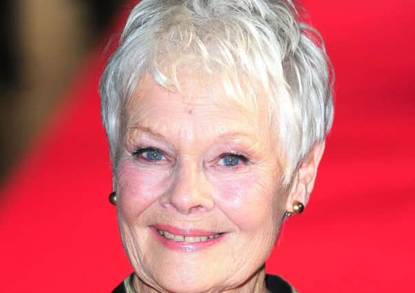 Embargoed to 0001 Monday October 20

File photo dated 16/10/13 of Dame Judi Dench who has revealed she learns a new poem or word every day to keep her mind active after a survey found nearly half of pensioners were concerned about life in older age. PRESS ASSOCIATION Photo. Issue date: Monday October 20, 2014. The Oscar-winning actress, 79, joined actor Sir Tony Robinson and Slade frontman Noddy Holder for the poll of more than 2,000 people aged over 65, in which they were asked for their "bucket list" of things they want to do before they die.  See PA story SHOWBIZ Dench. Photo credit should read: Ian West/PA Wire