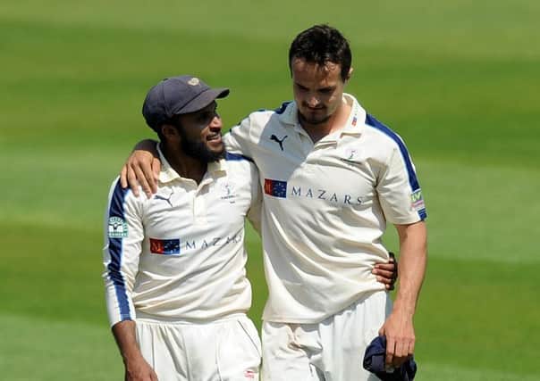 Yorkshire's Adil Rashid walks off in victory with Jack Brooks, on the day he was selected for the England Ashes squad..
(Picture: Jonathan Gawthorpe).
