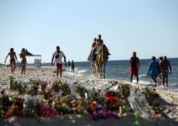 Tributes on the beach in Sousse, Tunisia were 38 holidaymakers were shot dead