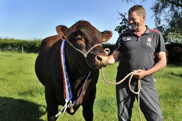 Chris Page, pictured with his champion Lincolnshire Red at Oak Tree Farm.  Pic: Bruce Rollinson