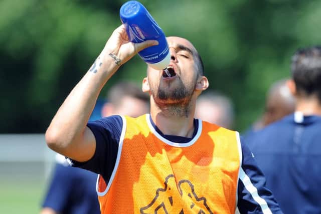 Giuseppe Bellusci has a drink in the hot weather. PIC: Simon Hulme