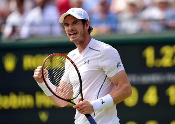 Andy Murray celebrates a point during his straight-forward defeat of Robin Haase yesterday at Wimbledon (Picture: Dominic Lipinski/PA).