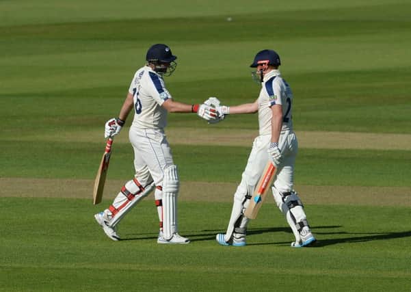 Yorkshire's Jonny Bairstow (right) celebrates his 50 with Tim Bresnan at Durham