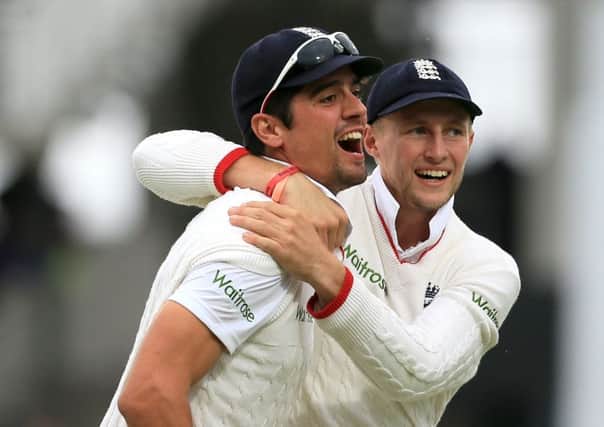 STAY POSITIVE: England's Alastair Cook and Joe Root.