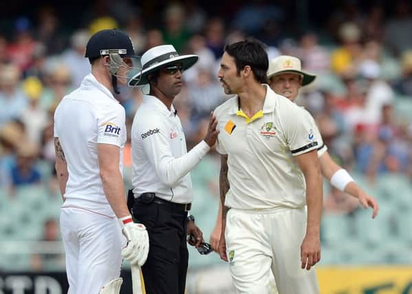 England's Ben Stokes (left) exchanges words with Australia's Mitchell Johnson (right) during day four of the Second Test Match at the Adelaide Oval, Adelaide in December 2013..