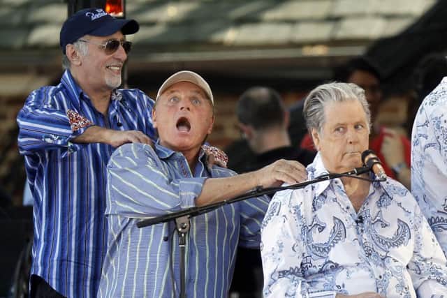Original members of The Beach Boys, from left, David Marks, Bruce Johnston and Brian Wilson appear onstage during ABC's "Good Morning America" summer concert series, Friday, June 15, 2012, in New York. (Photo by Jason DeCrow/Invision/AP).