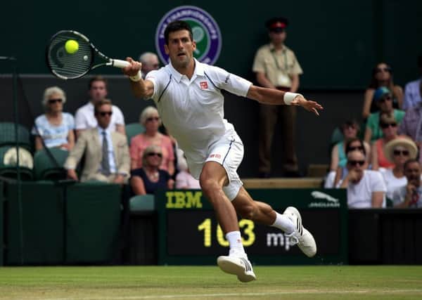 Novak Djokovic in action against Bernard Tomic.