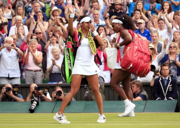 Heather Watson and Serena Williams leave centre court.