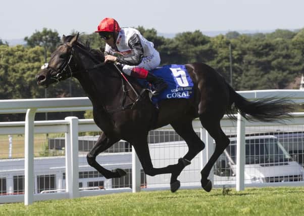 Golden Horn, ridden by Frankie Dettori, leads the field home to win the Coral-Eclipse at Sandown (Picture: Julian Herbert/PA Wire).