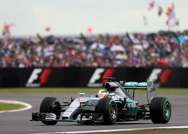 Lewis Hamilton on the road to victory at Silverstone.