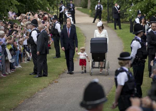 The Duke and Duchess of Cambridge with Prince George and Princess Charlotte as they arrived at the Church of St Mary Magdalene in Sandringham, Norfolk.  Pic: Matt Dunham/PA Wire