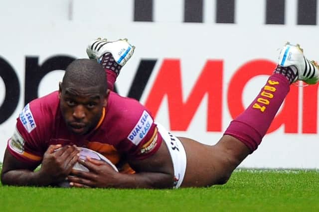 Huddersfield Giants' Jermain McGillvary scores his sides fifth try. (Pic by John Rushworth)