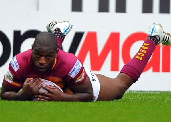 Huddersfield Giants' Jermain McGillvary scores his sides fifth try. (Pic by John Rushworth)