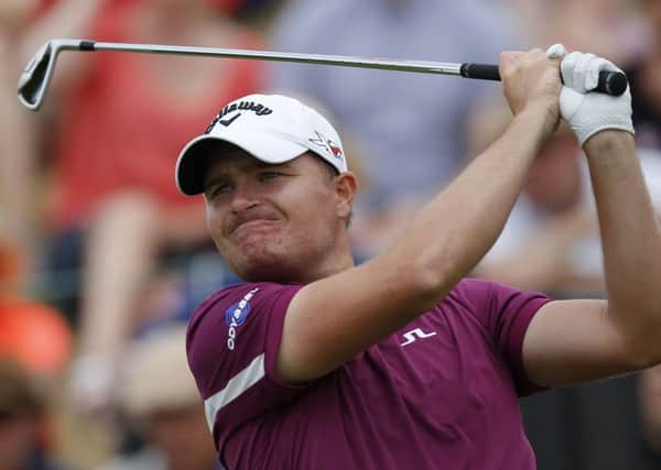 James Morrison of England, tees off at the first hole during the final round of the French Open Golf tournament at Paris National course in Guyancourt, west of Paris, France.. (AP Photo/Michel Euler).