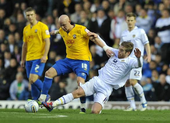 Southampton's Richard Chaplow and Leeds United's Adam Clayton (right) battle for the ball during the npower Football League Championship match at Elland Road, Leeds. PRESS ASSOCIATION Photo. Picture date: Saturday March 3, 2012. See PA story SOCCER Leeds. Photo credit should read: PA Wire. RESTRICTIONS: Editorial use only. Maximum 45 images during a match. No video emulation or promotion as 'live'. No use in games, competitions, merchandise, betting or single club/player services. No use with unofficial audio, video, data, fixtures or club/league logos.