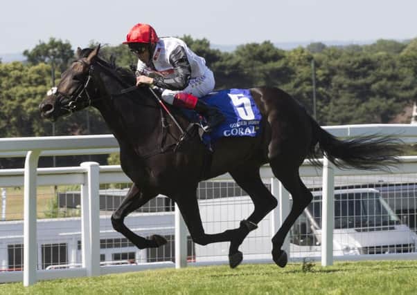 Golden Horn ridden by Frankie Dettori leads the field home to win The Coral-Eclipse. Picture: Julian Herbert/PA