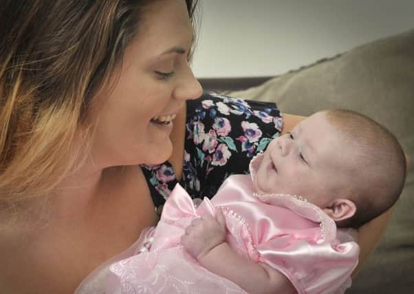 Mum Rachel Broddle with 10 week old baby Willow Butler, facing challenges with a heart defect. Picture: Richard Ponter