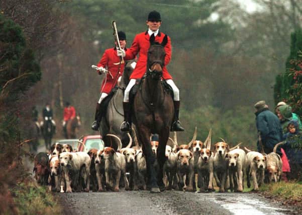 A file photograph of huntsmen at the 1996 Boxing Day hunt at Houstoun near Glasgow. Photo by Jeff J Mitchell REUTERS