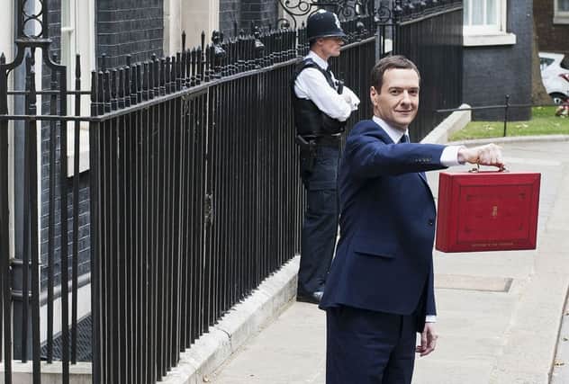 Chancellor of the Exchequer George Osborne outside 11 Downing Street before heading to the House of Commons to deliver his first Tory-only Budget. (Picture: Lauren Hurley/PA Wire)