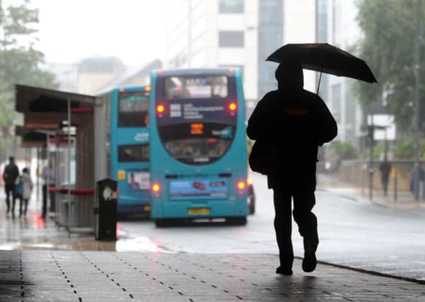 The downpours continued in Leeds city centre today.  Pic: Simon Hulme