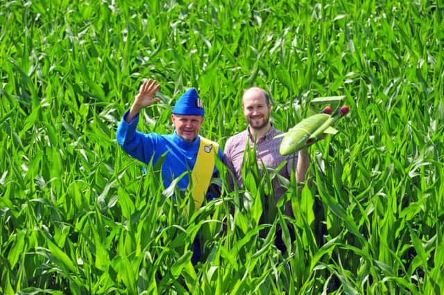 Farmer Tom Pearcy, right, with Jamie Anderson, son of the late Gerry Anderson, at the York Maze. Picture by Tony Johnson