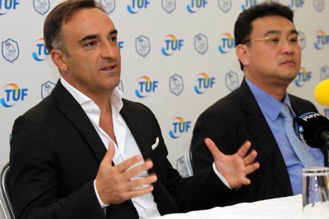 MEET THE BOSS: Carlos Carvalhal and, left, owner chairman Dejphon Chansiri.