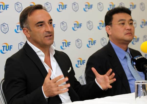 MEET THE BOSS: Carlos Carvalhal and, left, owner chairman Dejphon Chansiri.