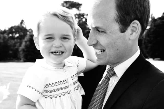 The Duke of Cambridge and his son, Prince George, after the christening of Princess Charlotte of Cambridge at Sandringham on Sunday. Picture: Mario Testino / Art Partner