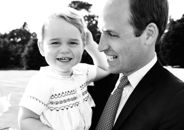 The Duke of Cambridge and his son, Prince George, after the christening of Princess Charlotte of Cambridge at Sandringham on Sunday. Picture: Mario Testino / Art Partner