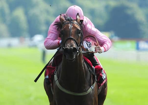 Lucky Kristale ridden by Tom Queally wins the Connolly's Red Mills Lowther Stakes during day two of the 2013 Yorkshire Ebor Festival. Picture: Anna Gowthorpe/PA.