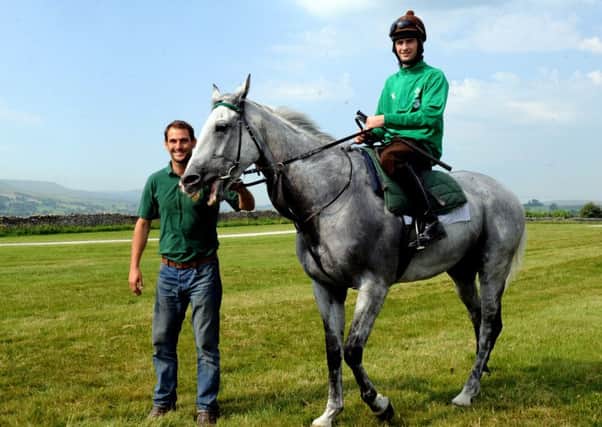 Trainer Phil Kirby on the gallops at Middleham with Brian Toomey on Kings Grey . (Picture: Gary Longbottom)