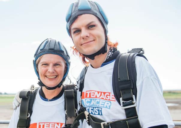 Jane and Chris Sutton, the mother and brother of Stephen Sutton, who helped set a new world record for tandem parachute jumps within 24 hours at a single venue, in honour of Stephen.  Pic: Ben Bentley/PA Wire
