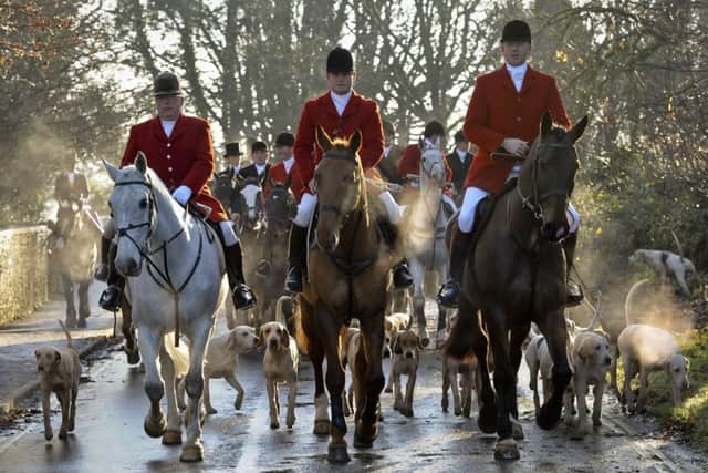 The Avon Vale hunt making its way to the village of Laycock, Wiltshire.