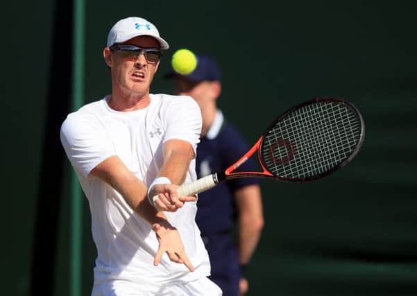 Jamie Murray in action during his doubles match with partner John Peers.