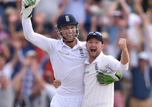 England's Jos Buttler (left) and Adam Lyth (right) celebrate victory in the First Investec Ashes Test at the SWALEC Stadium, Cardiff. Picture: Joe Giddens/PA.