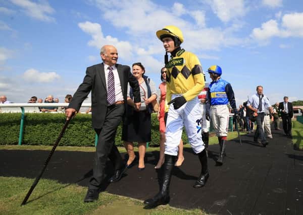 Jockey Brian Toomey enters the parade ring on his come back race at Southwell Racecourse. Picture: Nigel French/PA Wire.