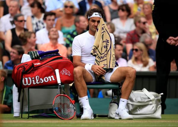 Roger Federer toiled but was unable to earn a record eighth mens singles title in yesterdays final (Picture: Mike Egerton/PA).