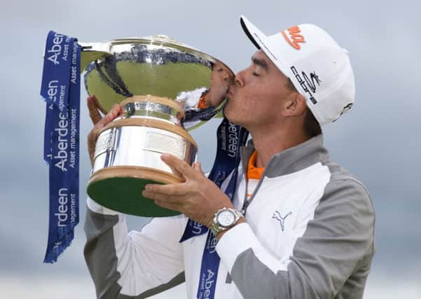 Ricky Fowler kisses the trophy after his win yesterday in the Aberdeen Asset Management Scottish Open at Gullane (Picture: Kenny Smith/PA).
