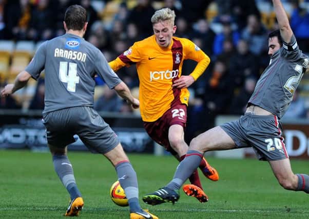 City's Oliver McBurnie sets off on a run.
