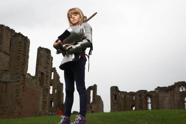 Thea Hunt, 8, from Wordsley, West Midlands, is announced as English Heritage's first ever Child Executive Officer at Kenilworth Castle in Warwickshire.  
Picture: David Parry/PA Wire