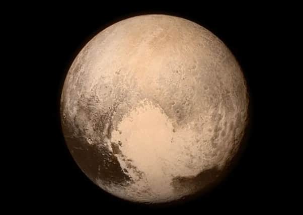 An early image of Pluto, captured by the New Horizon's probe.
