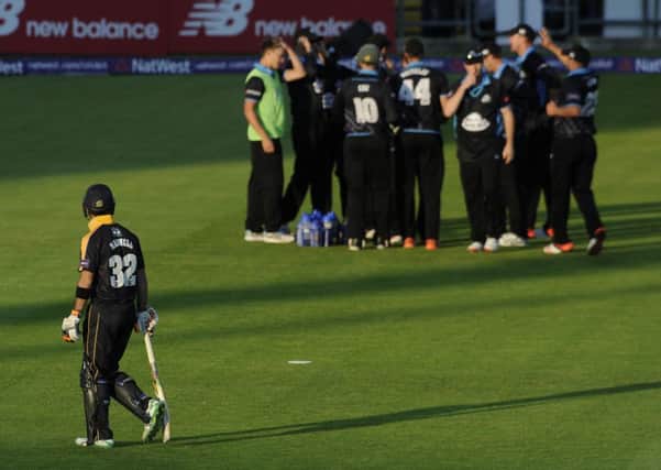 Glenn Maxwell walks after being caught for 0 by Tom Kohler-Cadmore bowled by Brett D'Oliveira.