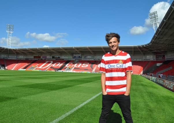 Doncaster Rovers fans Louis Tomlinson at the Keepmoat Stadium.