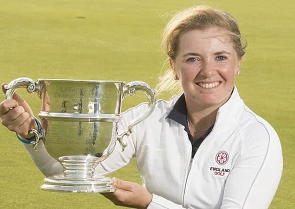 Bronte Law with the trophy after successfully defending her English women's amateur championship (Picture: Leaderboard Photography).