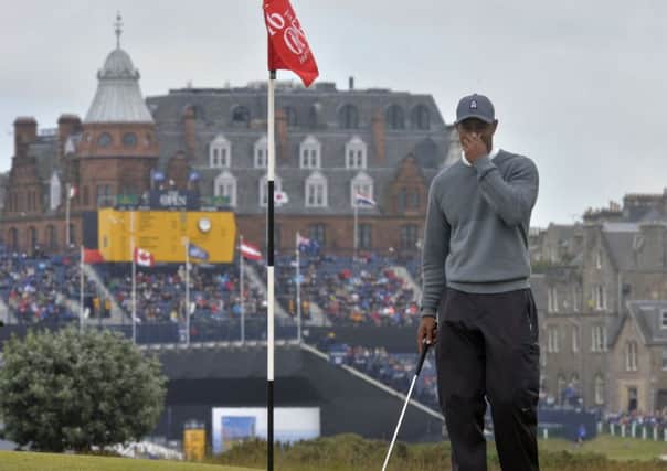 Tiger Woods looks dejected on the 16th hole during day one of the Open Championship at St Andrews (Picture: Owen Humphreys/PA Wire).