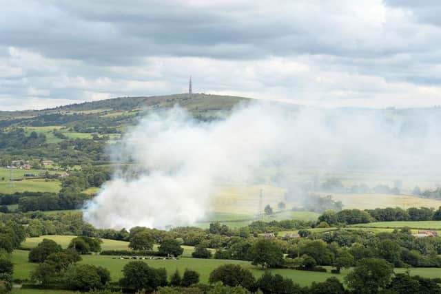 Smoke billows from Wood Flour Mills in Bosley, near Macclesfield